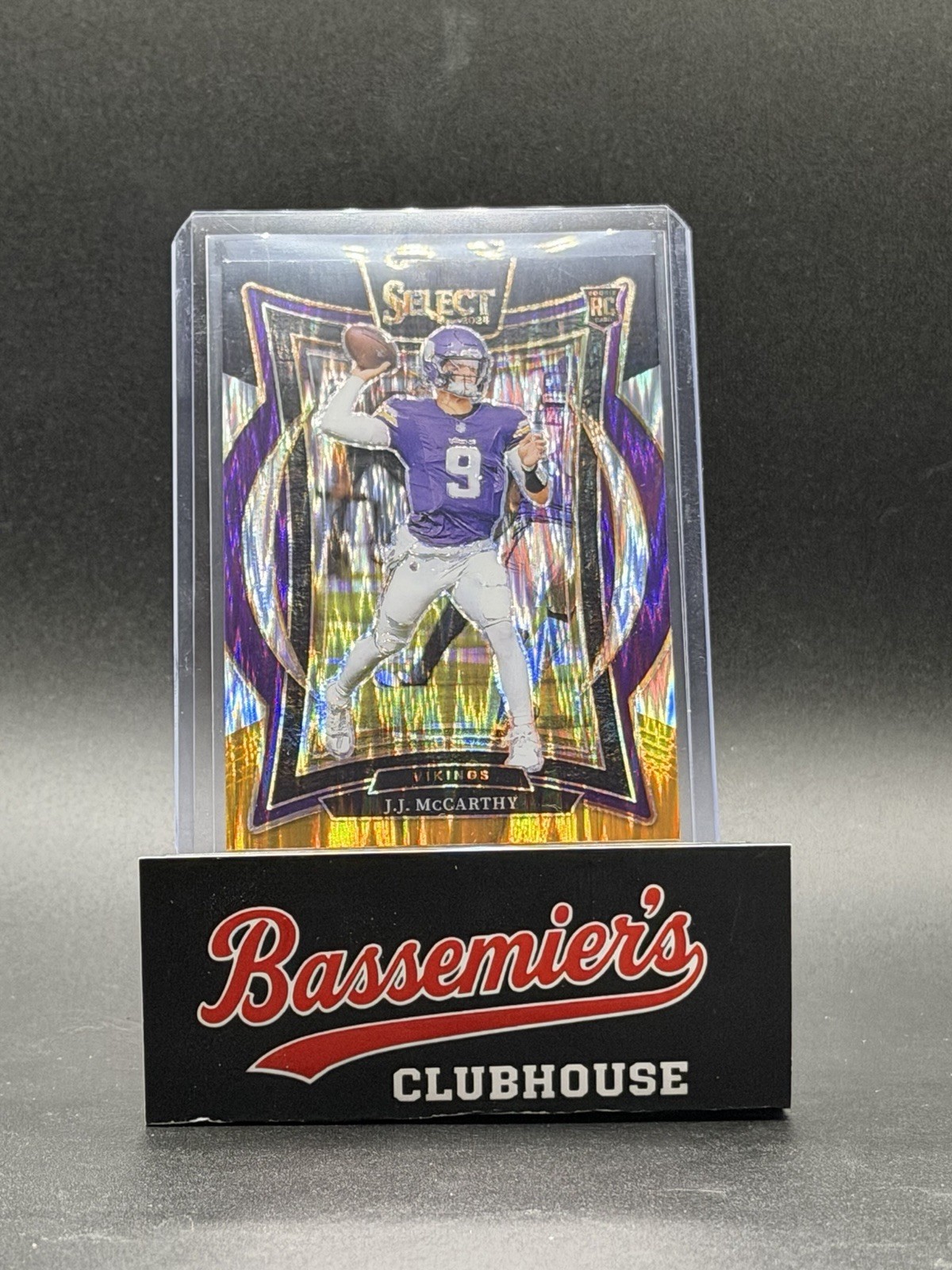 2024 Panini Select - Concourse J.J. McCarthy #24 Black & Gold Shock Prizm (RC)