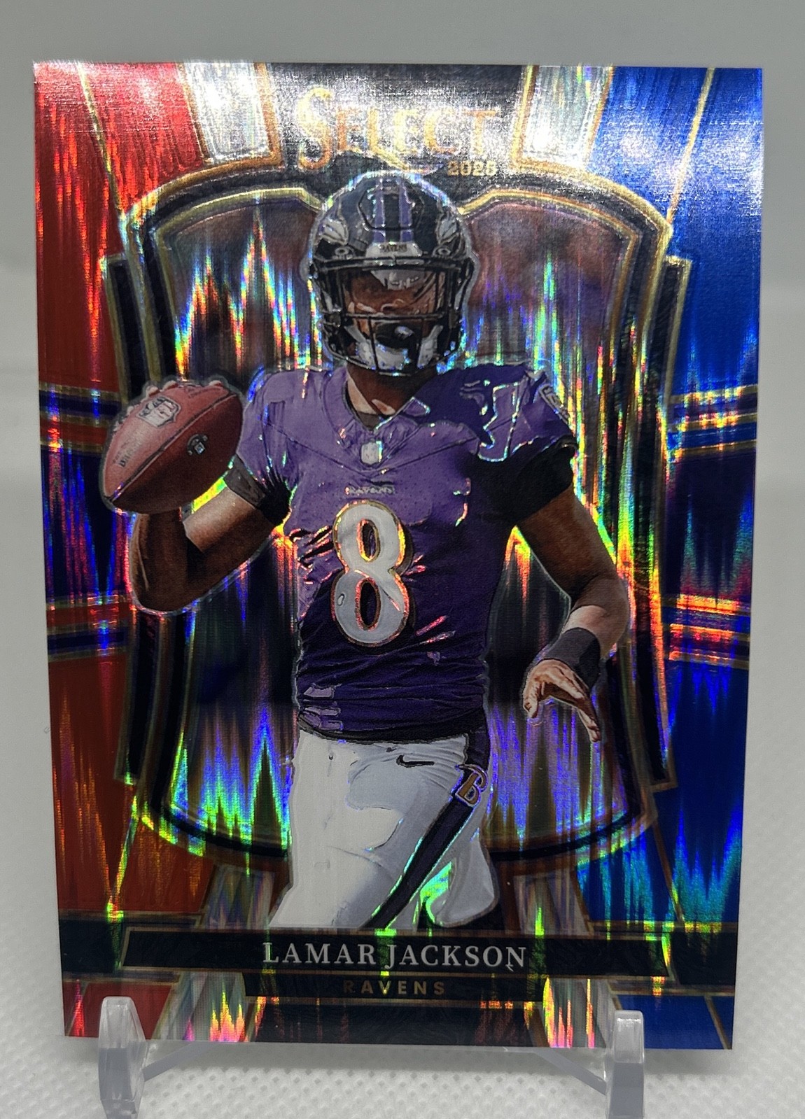 2025 Panini Select - Premier Level Lamar Jackson #160 Red & Blue Shock Prizm