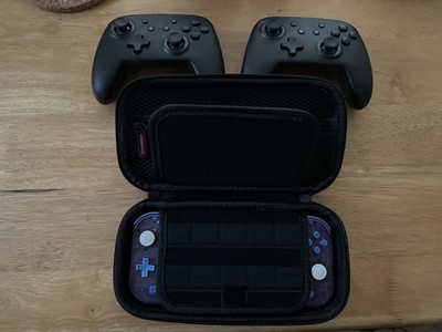 Nintendo Switch Lite Bundle - Super Smash Bros Ultimate, Case, and 2 Controllers
