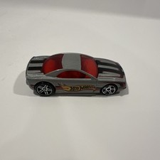 2017 HOT WHEELS MUSCLE TONE SILVER 1:64 DIECAST CAR W/ RED BLACK & YELLOW