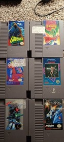 Nintendo NES Game Lot w/Godzilla, Quantum Fighter, Dragon Warrior, Gradius, Zapp