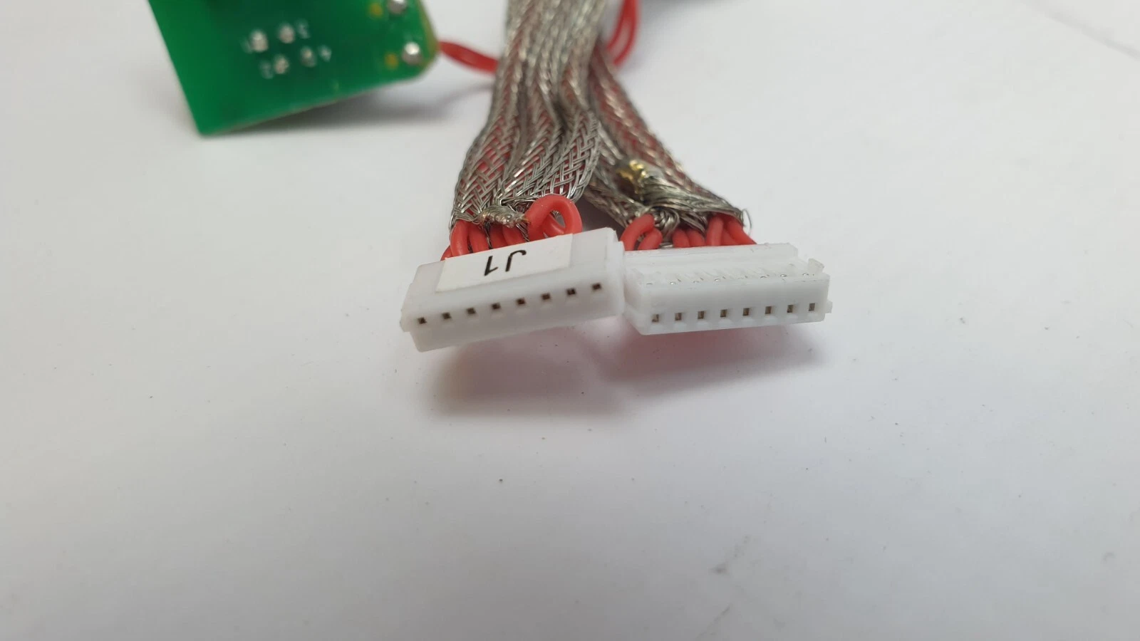 White wire-to-board connectors tagged J1 on the Galvo AcuPulse harness