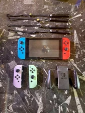 Nintendo Switch Mario 32GB Blue/Red Console + Green/Purple JoyCons + Accessories