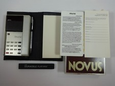 Novus Attache Calculator Year introduced 1975 Power Source 9V Sealed Untested