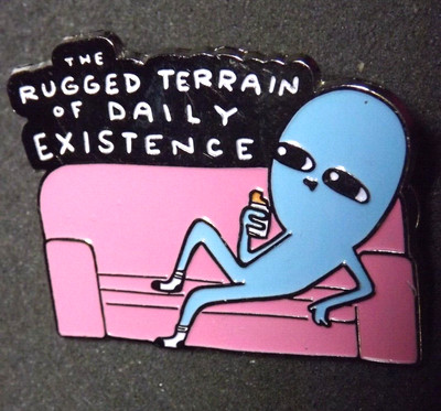 The Rugged Terrain of Daily Existence Lapel Pin Alien on Couch Strange Planet