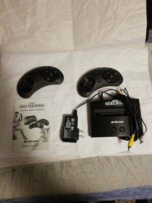 At Games Sega Genesis Classic Console  With 2 controller and 40 games  Built in.