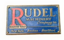 RUDEL MACHINERY CO INC HARTFORD BUFFALO NEW YORK ADVERTISING BRASS METAL EMBLEM