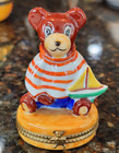 Limoges Dubarry Teddy Bear with Sailboat Pient Main Trinket Box. — photo 1
