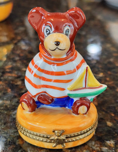 Limoges Dubarry Teddy Bear with Sailboat Pient Main Trinket Box.