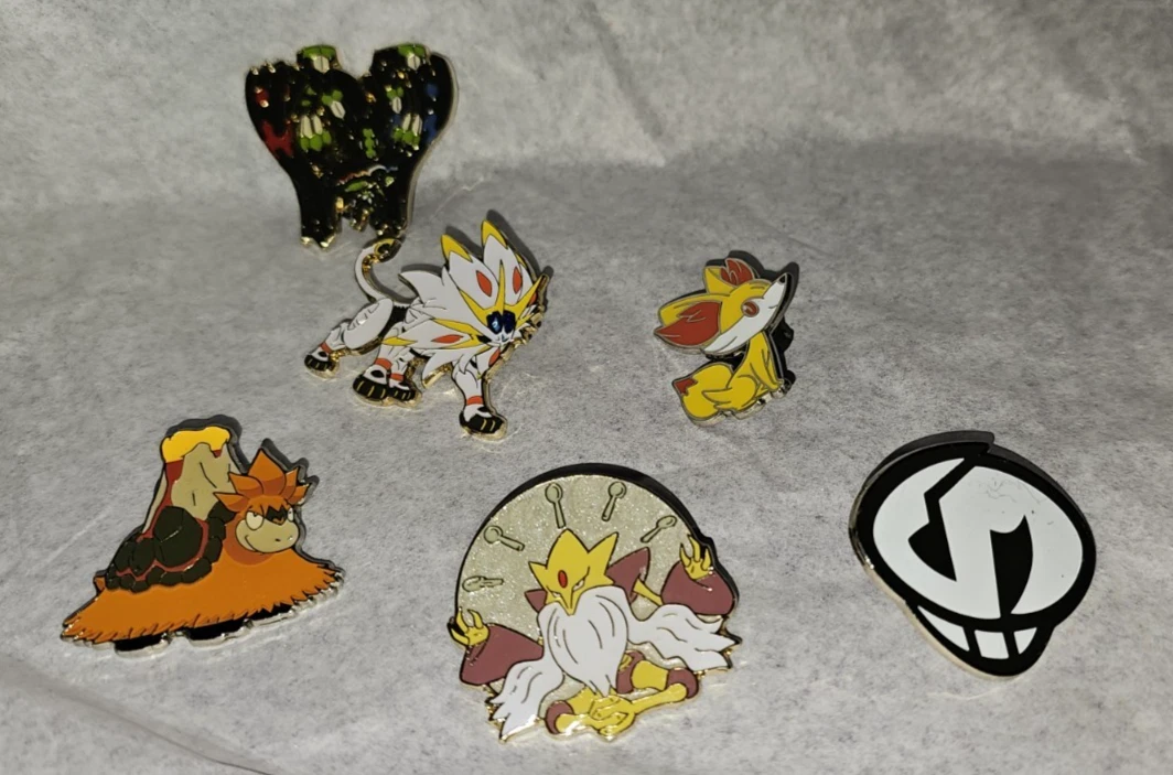 6 Pokemon Enamel Pins Team Skull Alakazam Camerupt Fennekin Solgaleo Zygarde