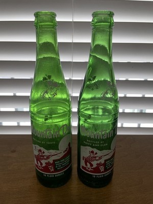 Lot of 2 Vintage Mountain Dew Bottles 10 Oz Bottled By Toots / Daisy And Clem