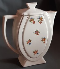 Cafetière en faïence, blanche motif petites fleurs. Années 50/60