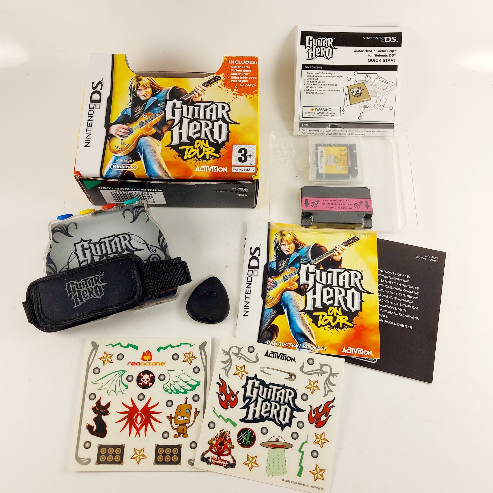 Guitar Hero On Tour - Nintendo DS - Cartridge, Grip, Pick Stylus, Booklets Boxed