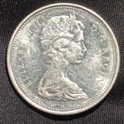 1965 Canada 25 Cents Silver Coin - AU (About Uncirculated) condition