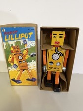 Lilyput robot collector series. NIB with Original packaging and wind-up key.