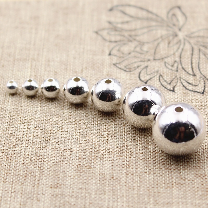 Elastische zilveren (925) ringen set van 2 mm kralen met bolletjes bedel