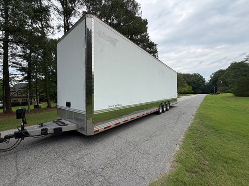 2010 Renegade Stacker Trailer Tri-Axle with Lift.
