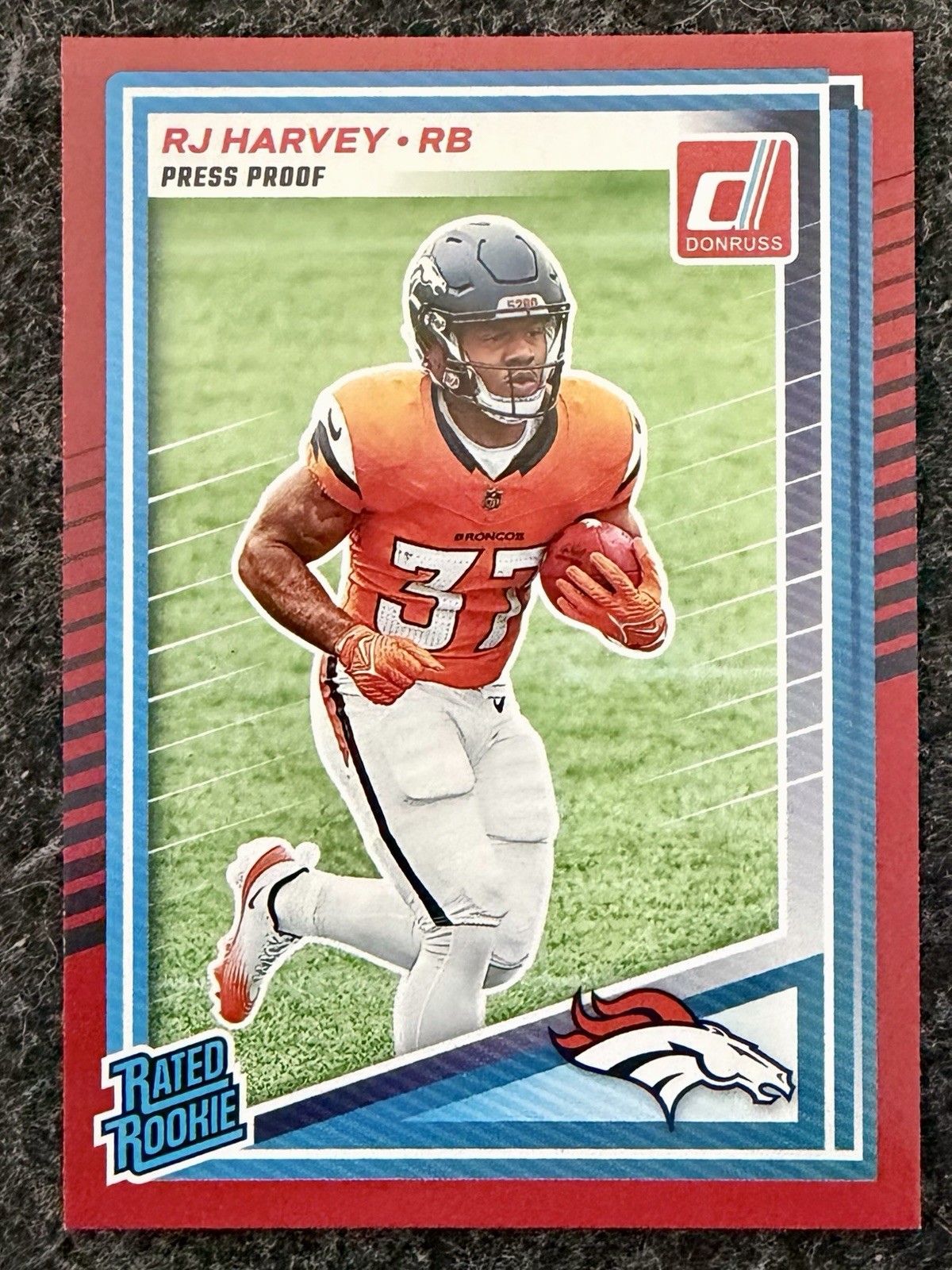 2025 Donruss RJ Harvey Rated Rookie Press Proof Red RC #312 Broncos