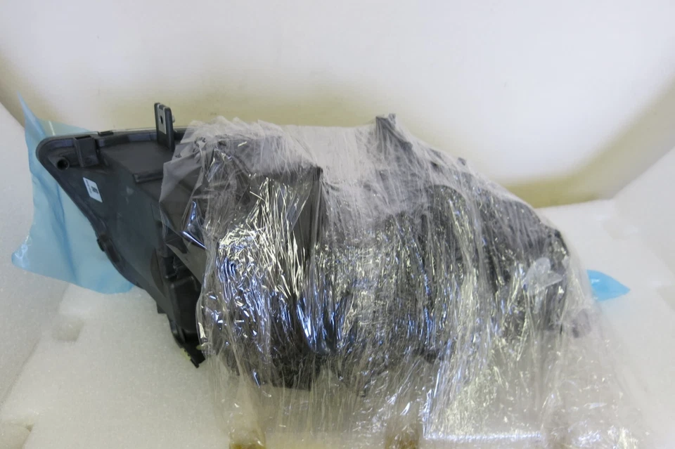 Conjunto de faros izquierdo Hella 354688051 para BMW 328i, 325i, 335i, 330i, 325xi, 328 Foto 3 de 4