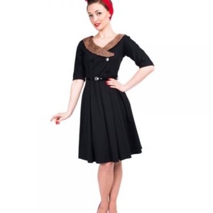 black dress with leopard trim