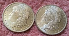 MORGAN SILVER DOLLAR COINS.  LOT OF 2 UNC.  PRE. 1921 LOT # 34