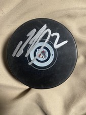 Dylan DeMelo autographed signed winnipeg jets team puck 