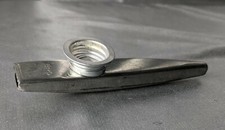 VINTAGE CLARKE TIN KAZOO. 4 3/4" IN LENGTH. MEMBRANE INTACT.