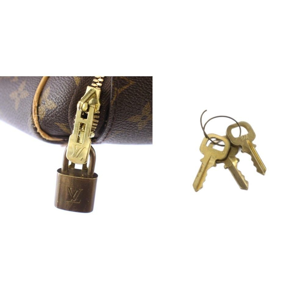 LOUIS VUITTON Monogram Evasion Boston Bag Handbag Canbus Logo Charm All Over thumbnail 4