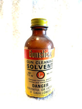 BOUTEILLES PUBLICITAIRES VINTAGE PISTOLET DE CHASSE NETTOYAGE GUNLICK VERRE AMBRÉ EXTÉRIEUR