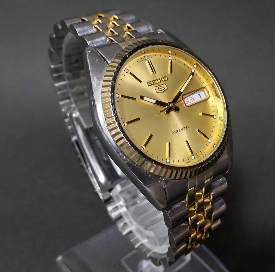 Seiko gold and top silver mens watch