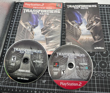 Transformers: The Game Greatest Hits (Sony PlayStation 2 PS2) W/ Bonus Disc CIB