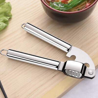Black Stainless Steel Garlic Press Crusher, For Kitchen, Size: 11x7x5cm at  Rs 50/piece in Kharagpur