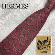 Excellent condition HERMES Tie hardware all over pattern 100 silk made in France