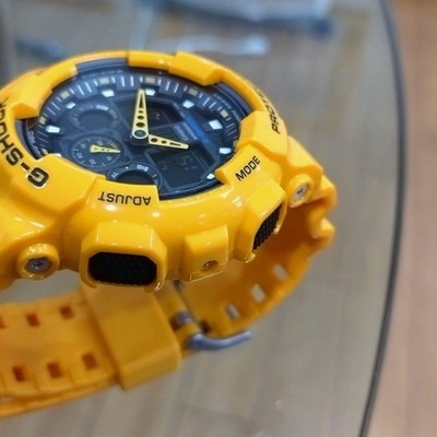 Casio G SHOCK GA 100A Yellow Digital Analog Hybrid Wristwatch