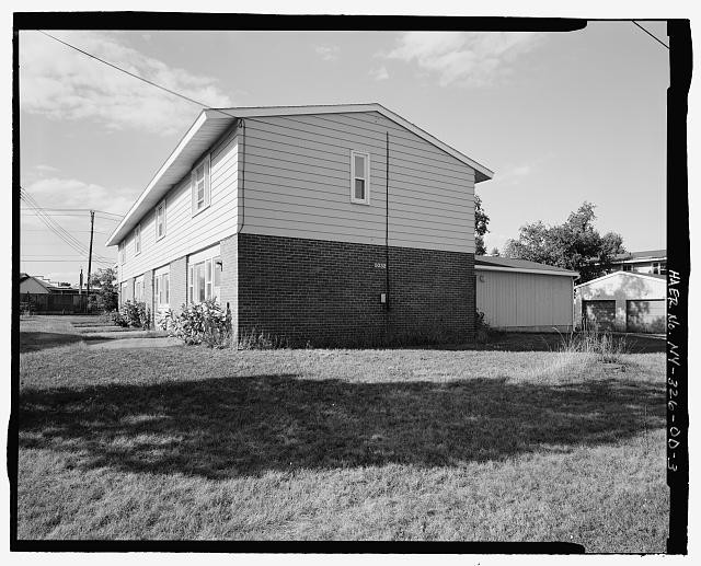 3. SOUTHEAST (SIDE) AND SOUTHWEST (REAR) ELEVATIONS OF BUILDING. VIEW TO NORTH.