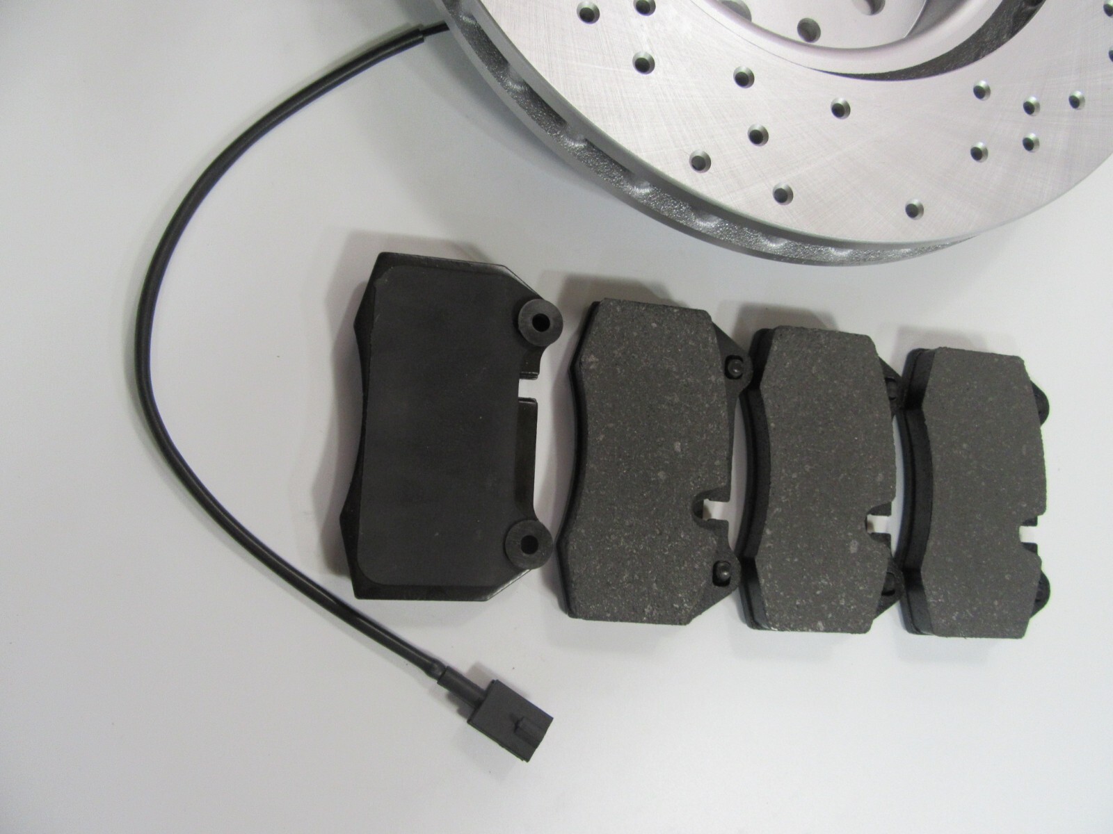 Maserati Quattroporte front brake pads & drilled rotors LOW DUST