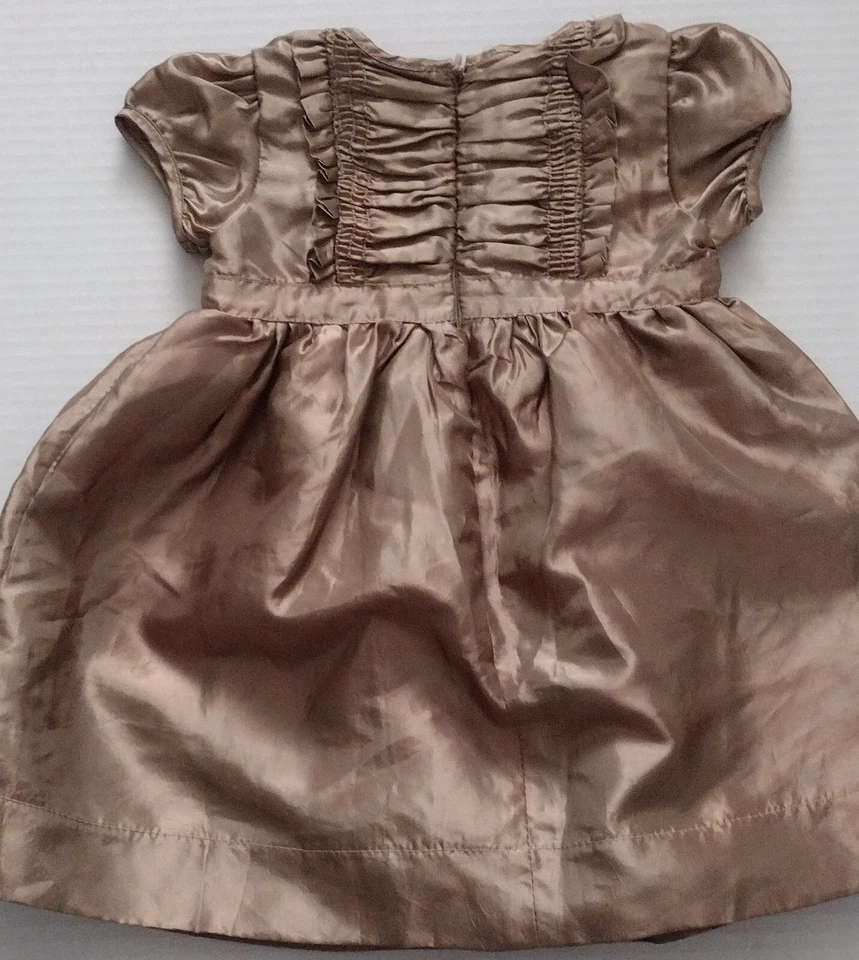 Vestido de Navidad formal dorado DKNY para niñas talla 6 meses. Foto 2 de 4