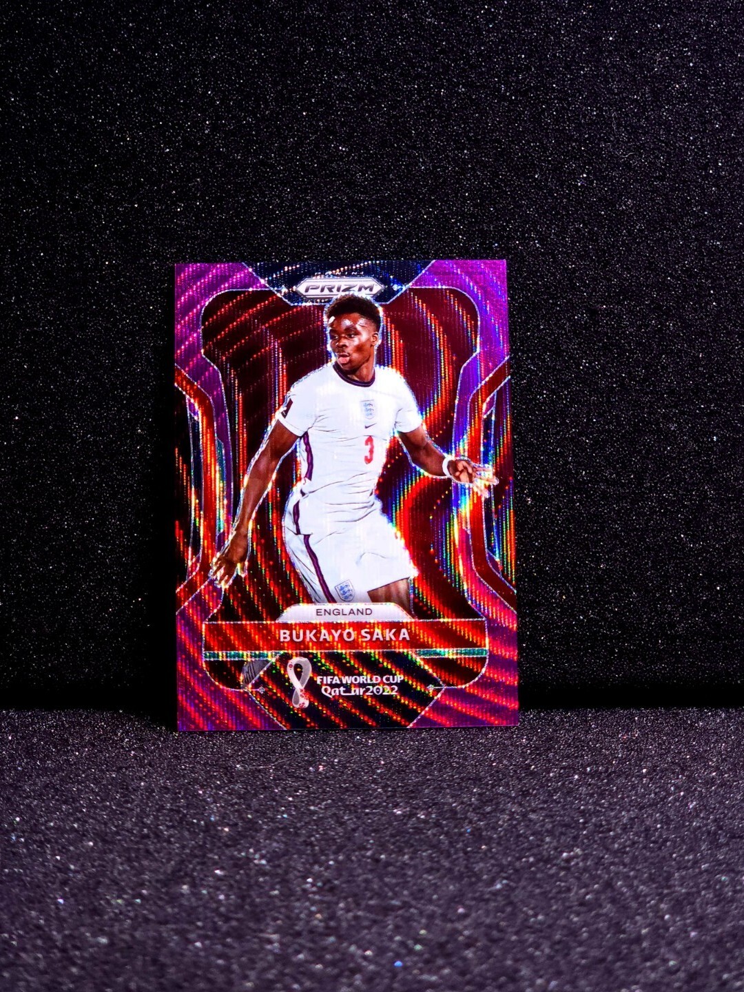 Bukayo Saka 2022 Panini Prizm FIFA World Cup PURPLE WAVE Prizm /99 #84
