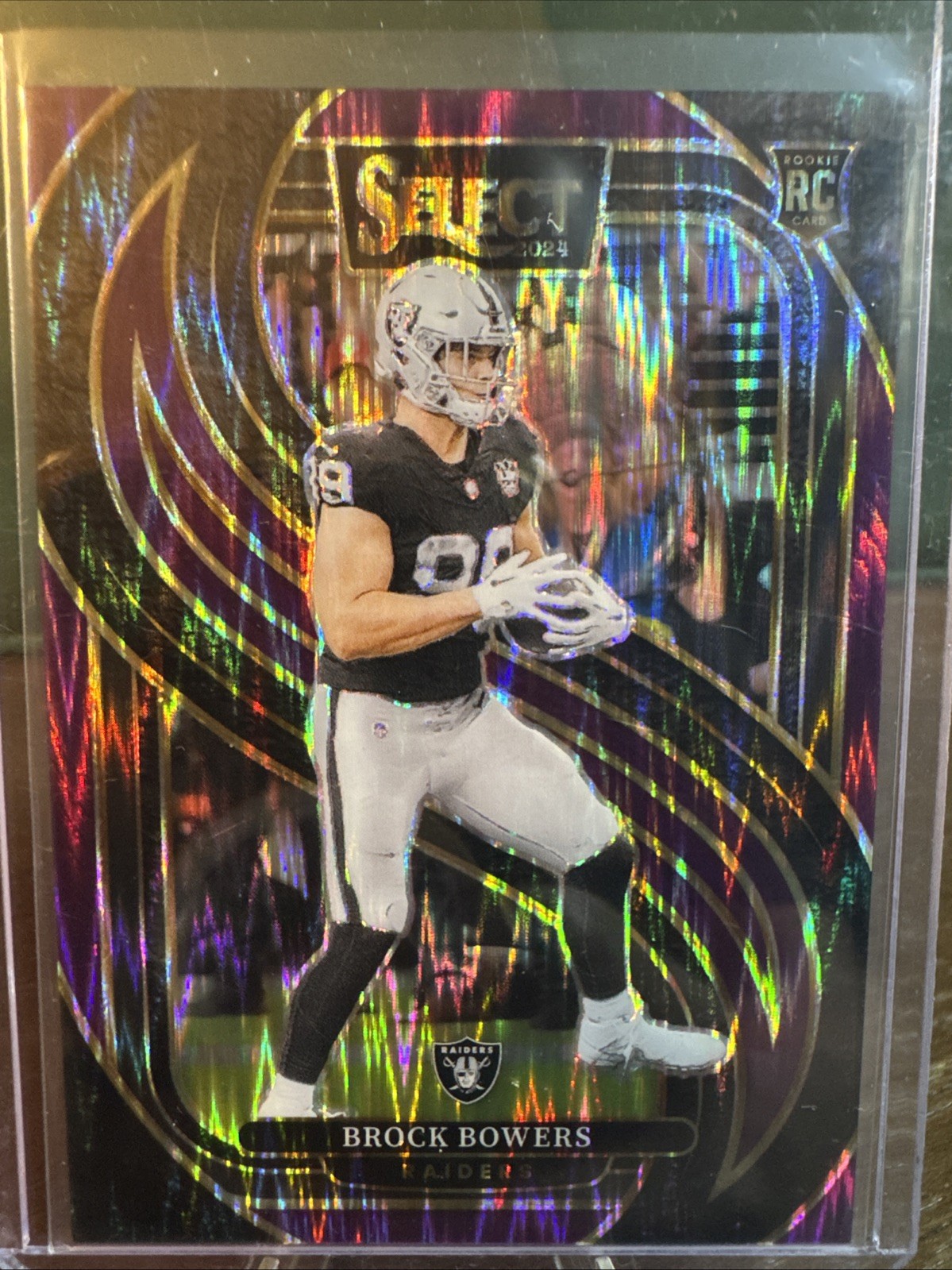 Brock Bowers 2024 Panini Select Premier Level #118 Purple Shock Prizm (RC)/360