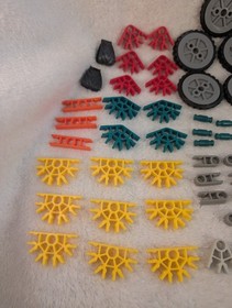 Assorted KNEX K&rsquo;nex Pieces Lot Of 65 Connectors / Rods / Wheels / Tires STEM