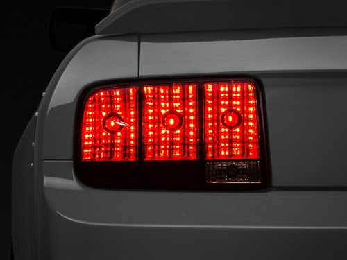 Raxiom 49066 for 05-09 Ford Mustang Tail Lights- Black Housing (Smoked Lens) - Picture 1 of 10