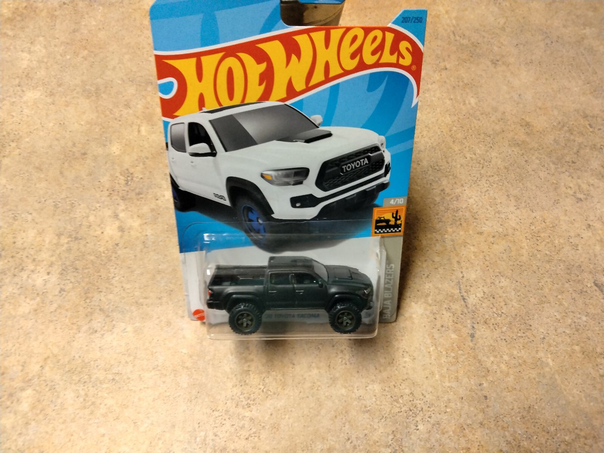 Hot Wheels Toyota Tacoma BLACK SUPER CUSTOM W/REAL RIDERS -SOLD