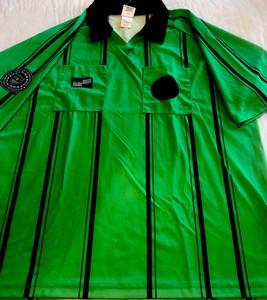 green referee shirt