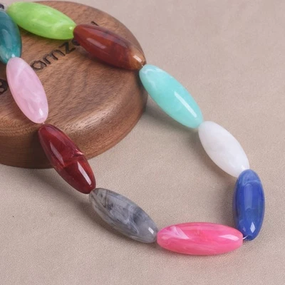20 pièces perles en vrac rugby forme ovale 31x12 mm résine plastique pour fabrication de bijoux bricolage - Photo 1/4