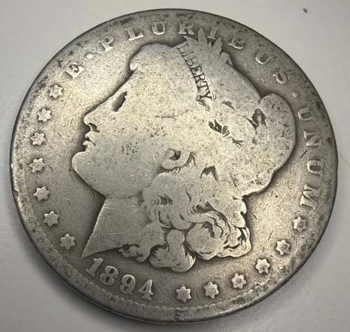 1894 O Morgan Silver Dollar - E7