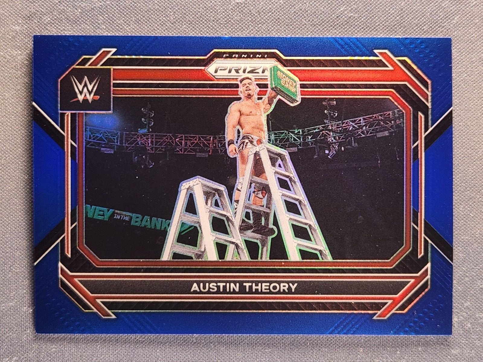 2023 Panini Prizm WWE #96 Austin Theory Blue Prizm /199 SP