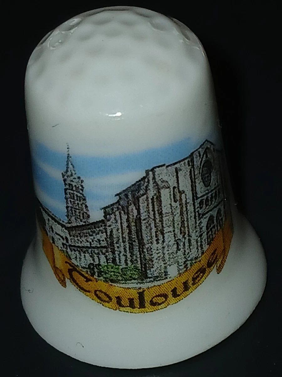 dé a coudre de collection en porcelaine ( MORZINE 2 photos
