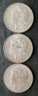 1884, 1887, and 1902 O $1 Morgan Silver Dollars