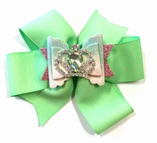 Beautiful Green bow with additional faux leather bow with green jeweled crown.