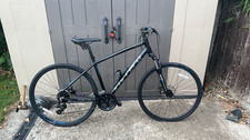 XDS Cross 700C Hybrid Bike L Black Flat Bar Mechanical Disc Derailleur Gears